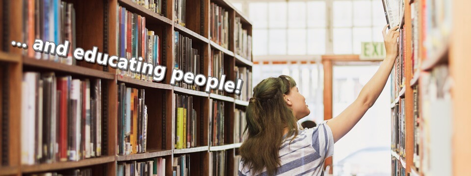 Girl picking a book from the library